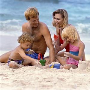 family in beach in greece