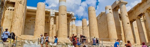 tourists in propylaea, acropolis, athens