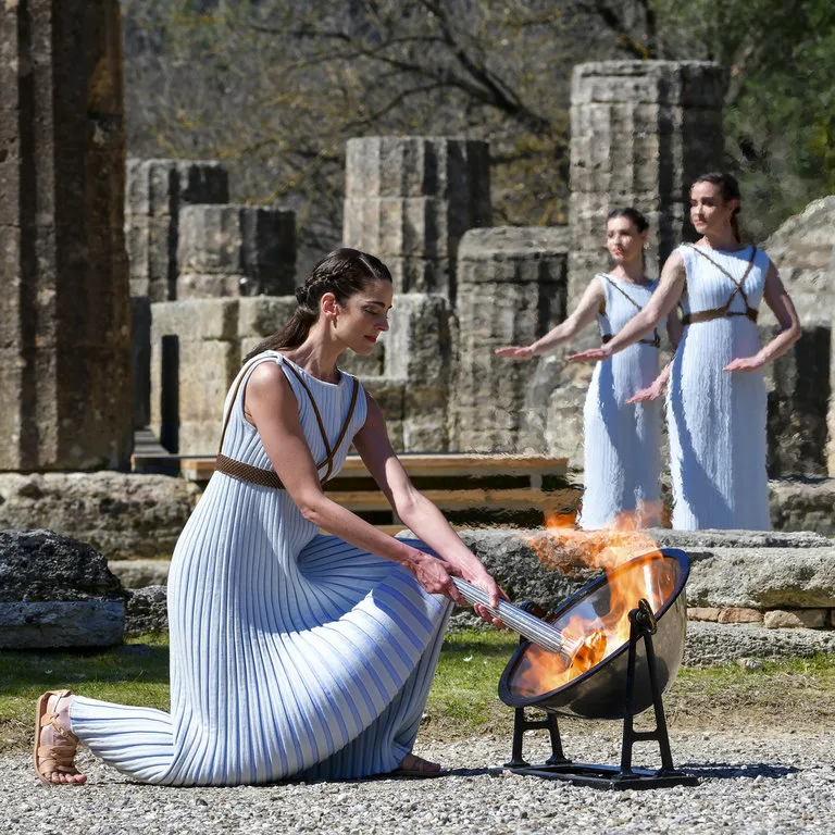 ceremonial lighting of the olympic flame in ancient olympia
