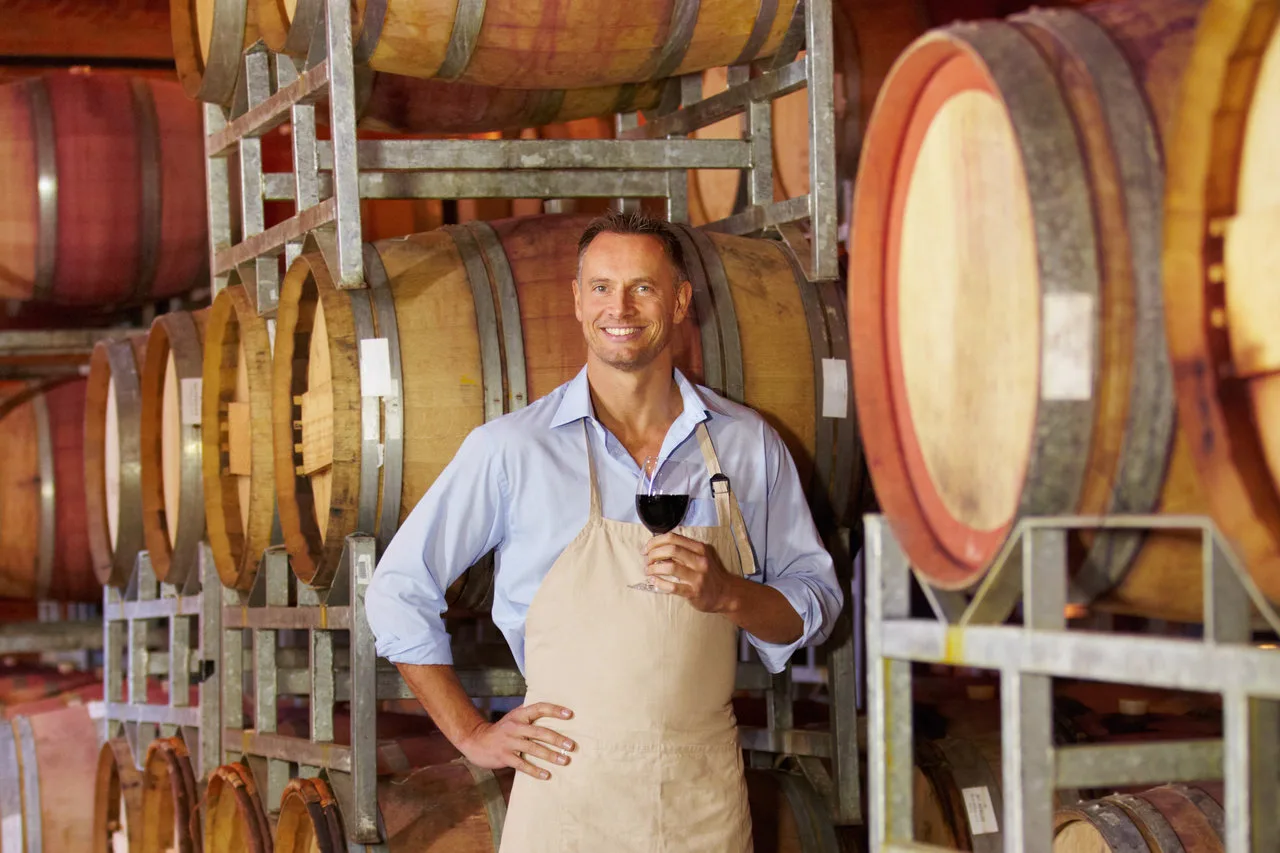 man in wine cellar